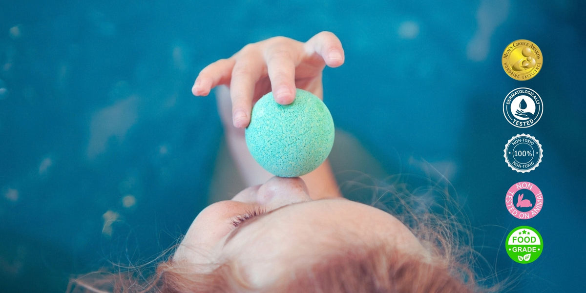 child with colour kids bath bomb
